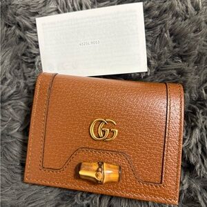 Gucci Brown Leather Wallet with Gold Logo